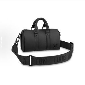 Elegant Black Duffel Bag by Louis Vuitton